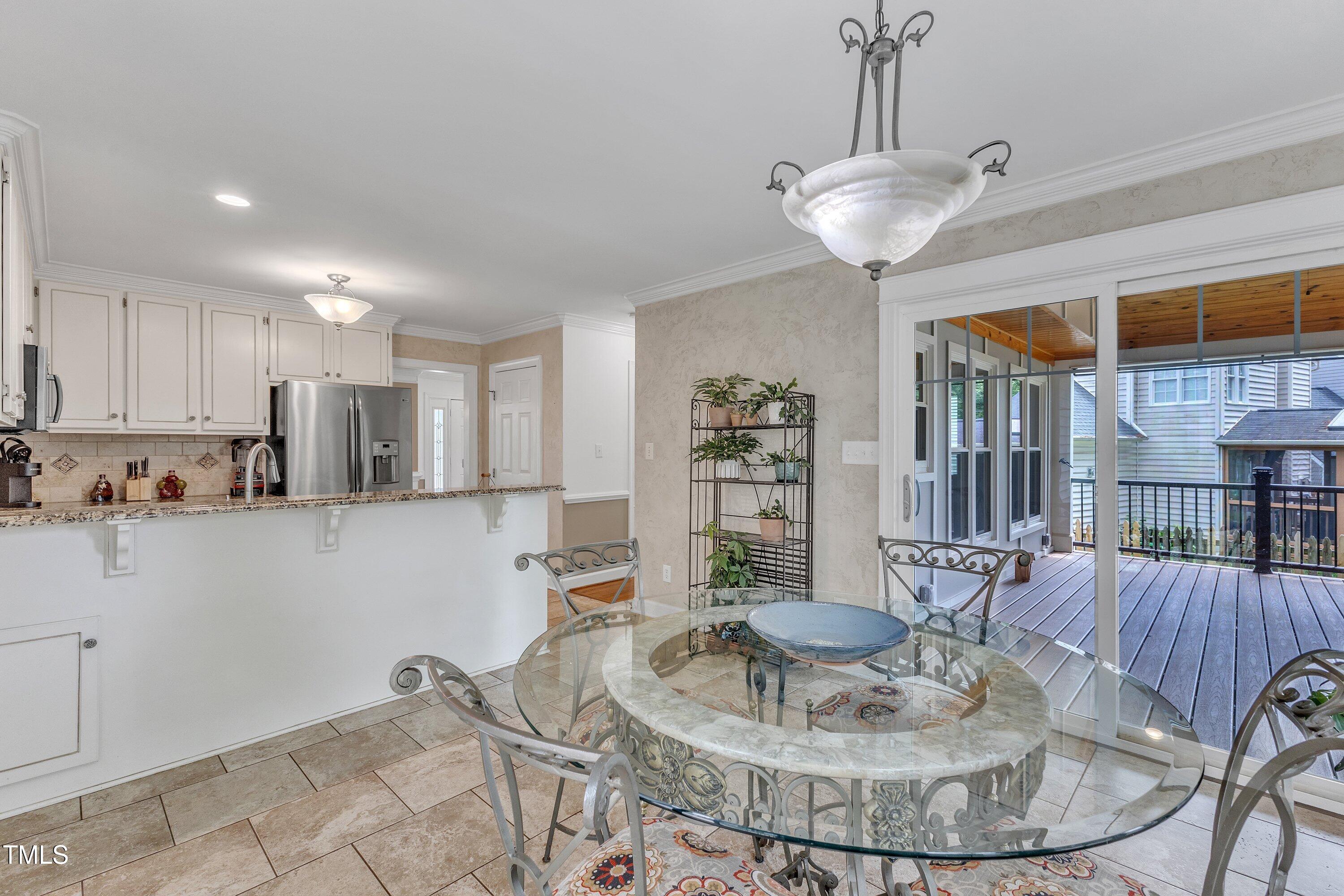 2721 Dahlgreen Road Raleigh, NC 27615 - Photo 20 of 59 a view of a dining room with furniture