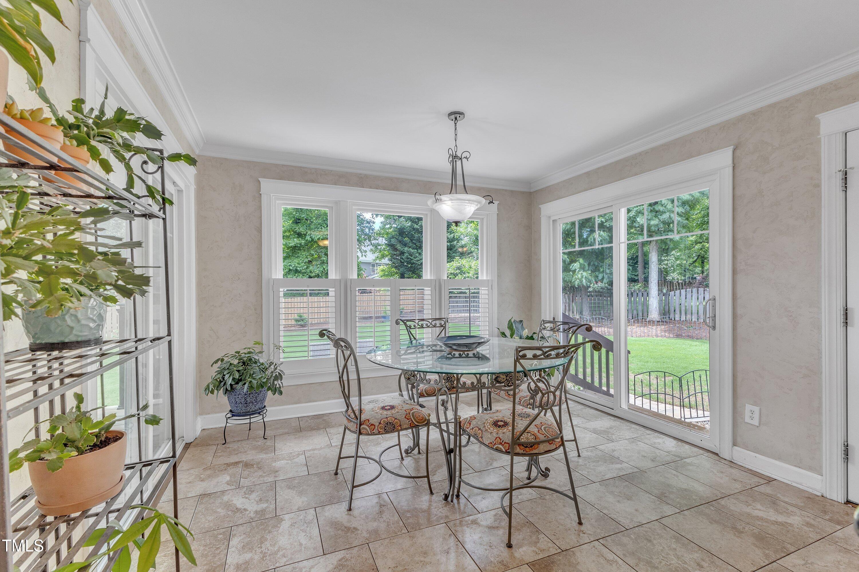 2721 Dahlgreen Road Raleigh, NC 27615 - Photo 21 of 59 a view of a dining room with furniture window and outside view