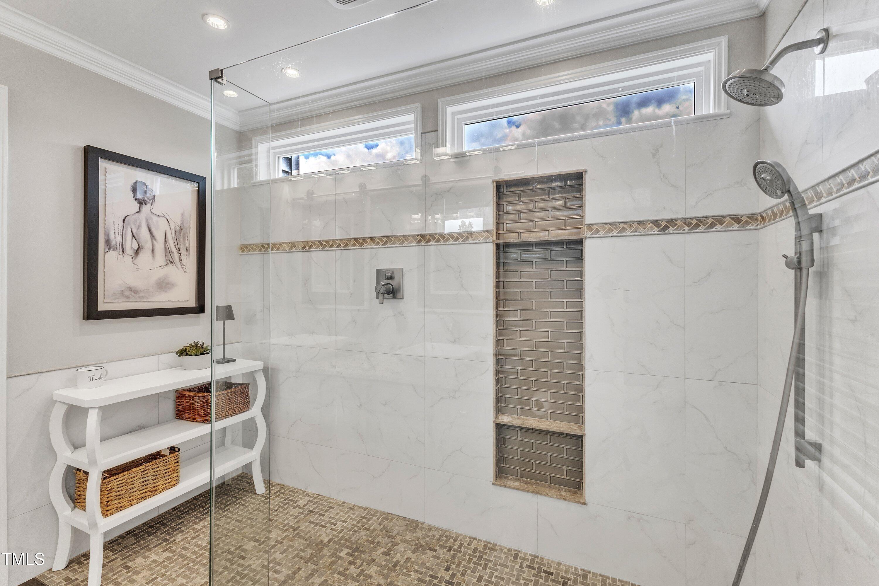 2721 Dahlgreen Road Raleigh, NC 27615 - Photo 31 of 59 a bathroom with a bathtub and a shower