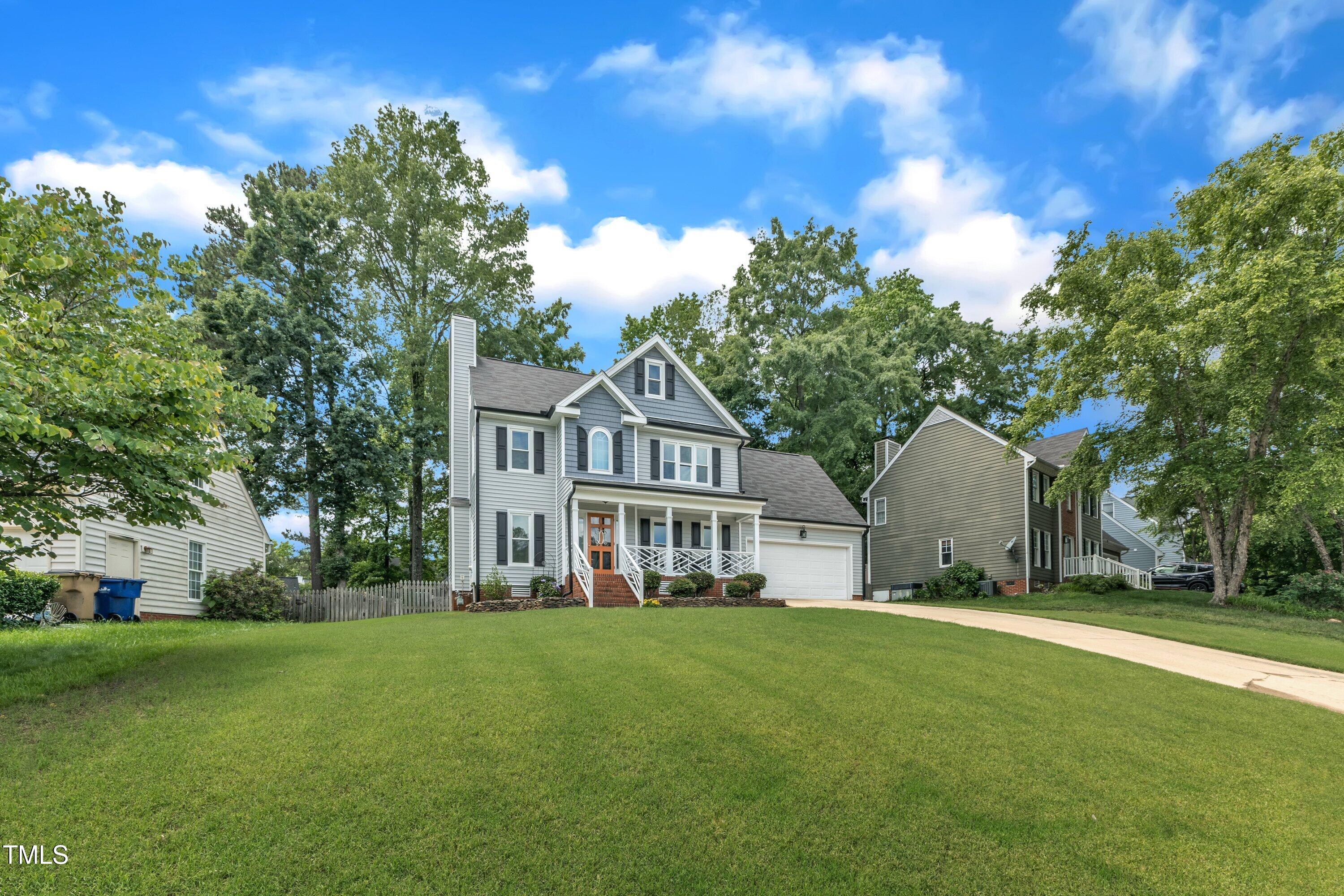 2721 Dahlgreen Road Raleigh, NC 27615 - Photo 3 of 59 a front view of a house with a garden