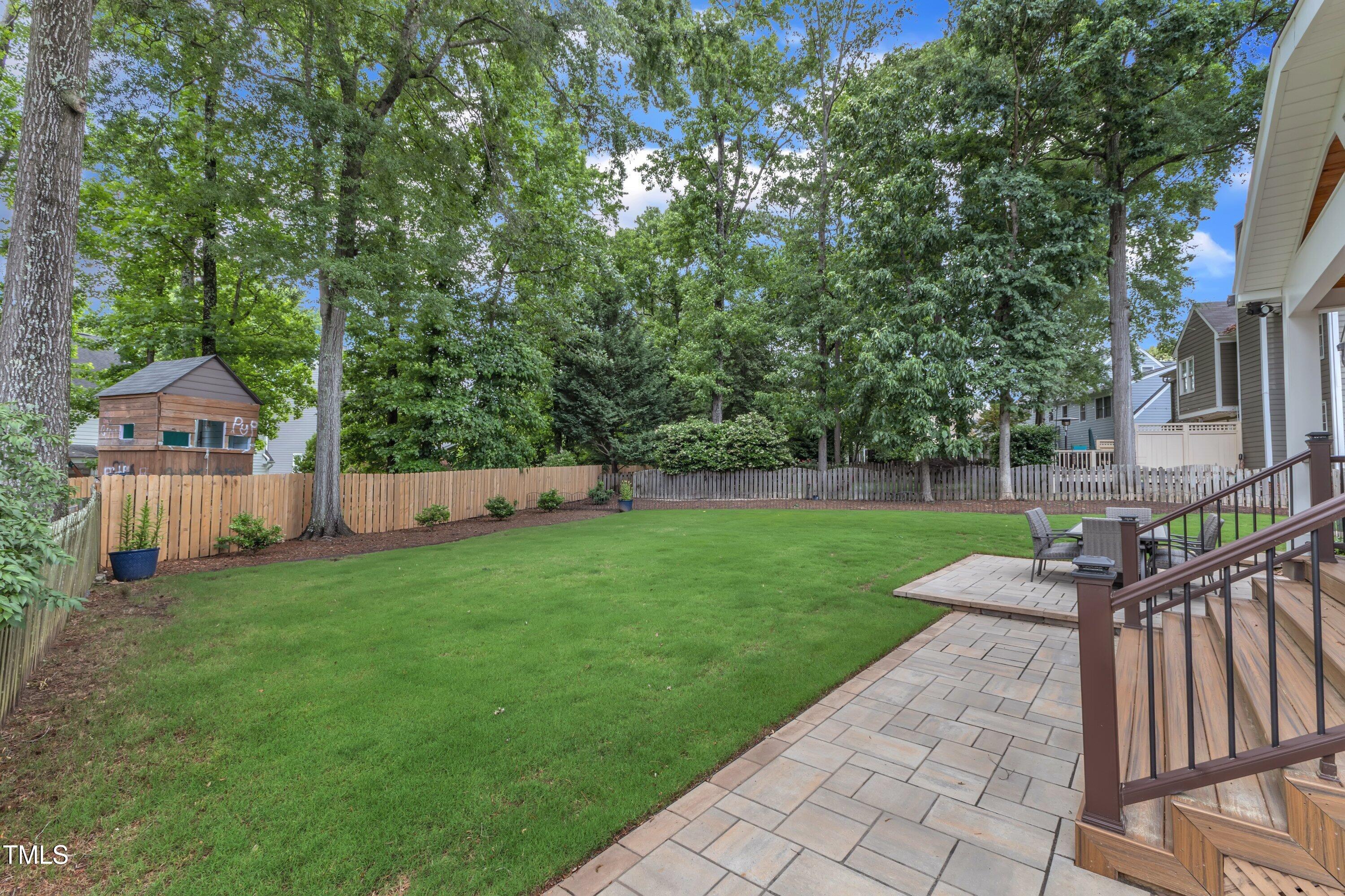 2721 Dahlgreen Road Raleigh, NC 27615 - Photo 48 of 59 a view of a house with backyard and a sitting area