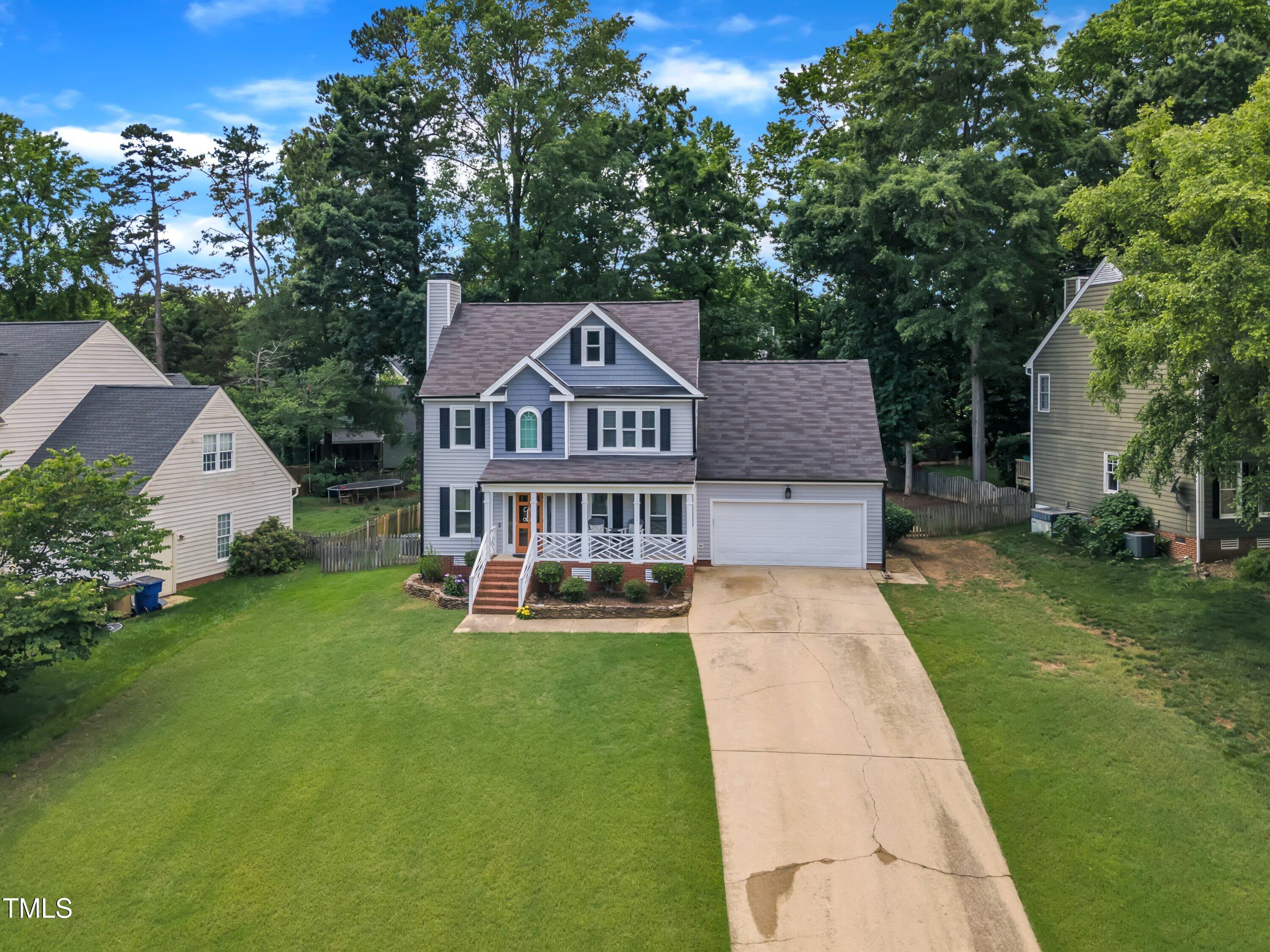 2721 Dahlgreen Road Raleigh, NC 27615 - Photo 50 of 59 a view of a house with a big yard plants and large trees