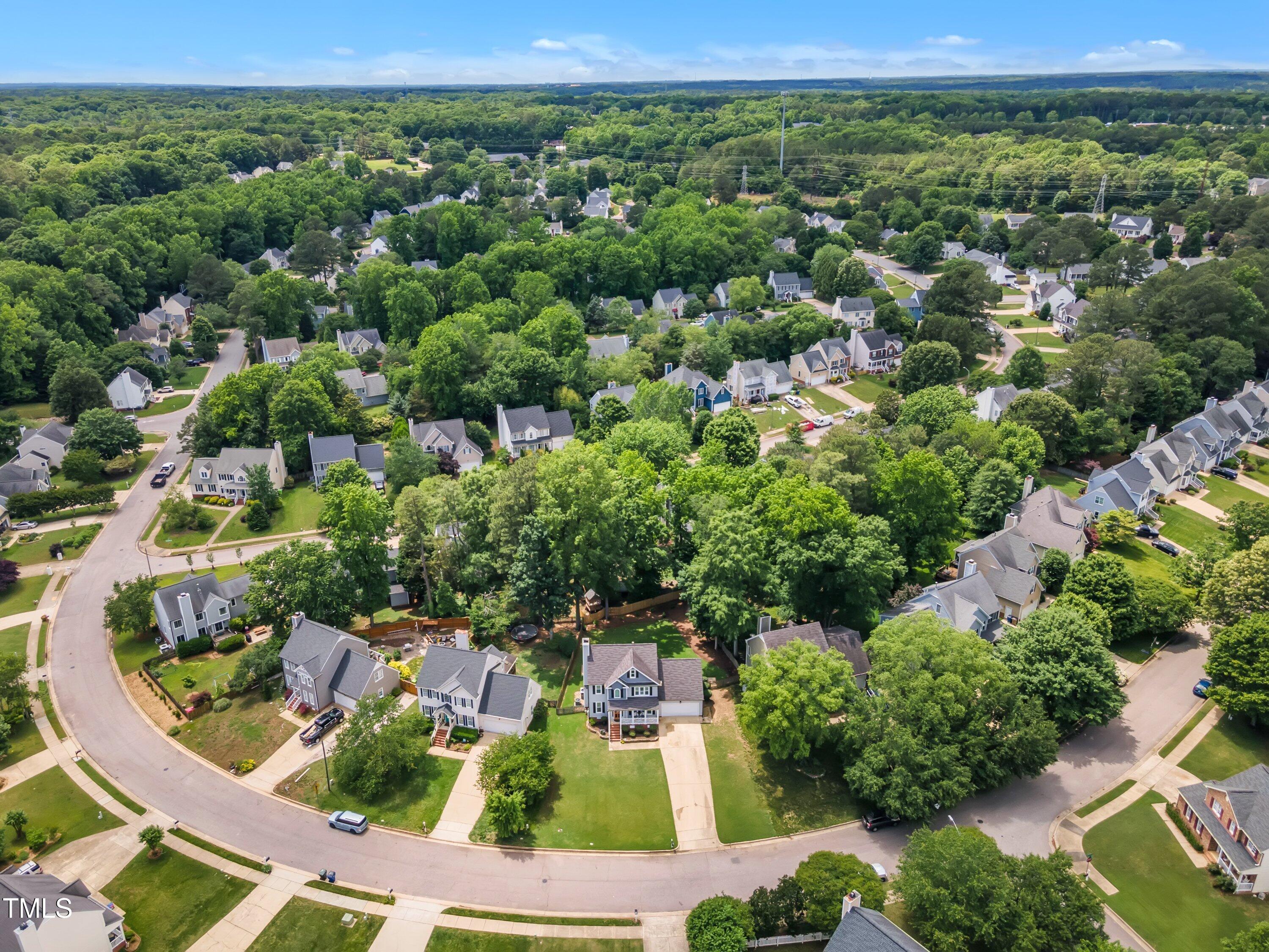 2721 Dahlgreen Road Raleigh, NC 27615 - Photo 54 of 59 an aerial view of residential houses with outdoor space and trees