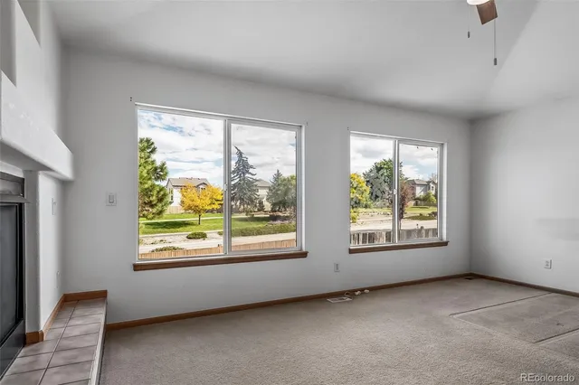 an empty room with windows