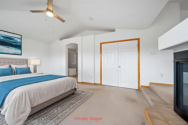 a bedroom with a bed and closet