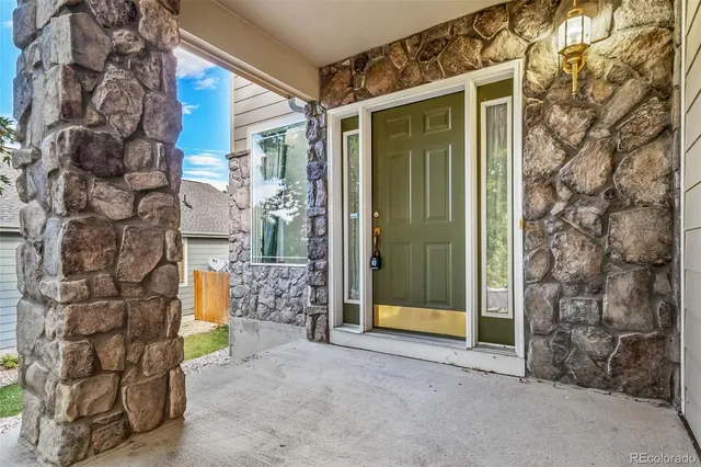 a view of entryway with brick walls