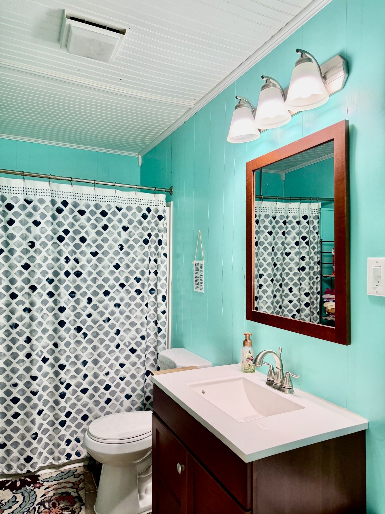 1340 Slaughter Road Lewisburg, KY 42256 - Photo 14 of 14 a bathroom with a sink a toilet and a mirror