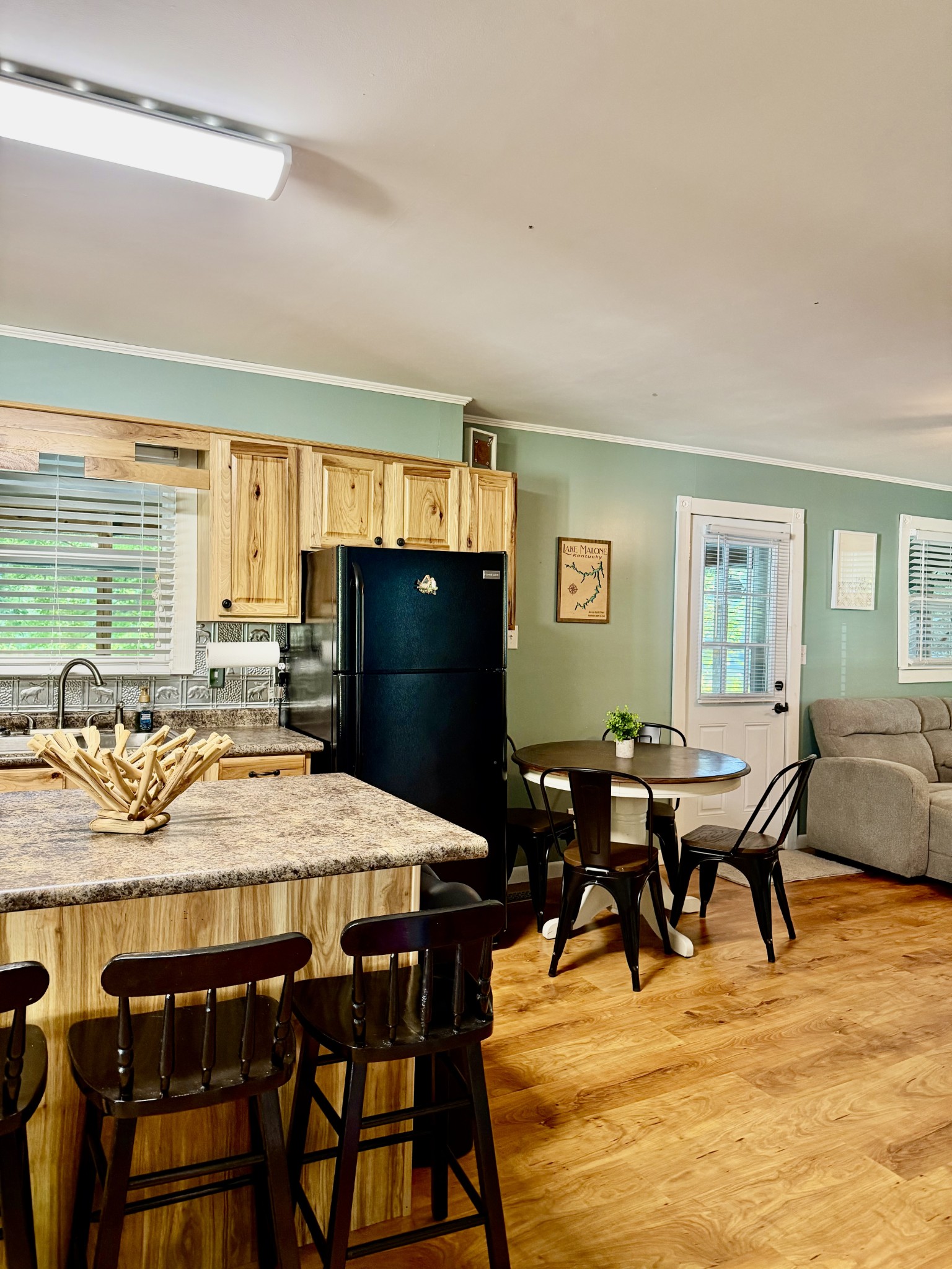 1340 Slaughter Road Lewisburg, KY 42256 - Photo 9 of 14 a view of a dining room with furniture