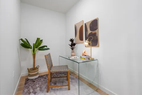 a vase of flowers sitting on a table