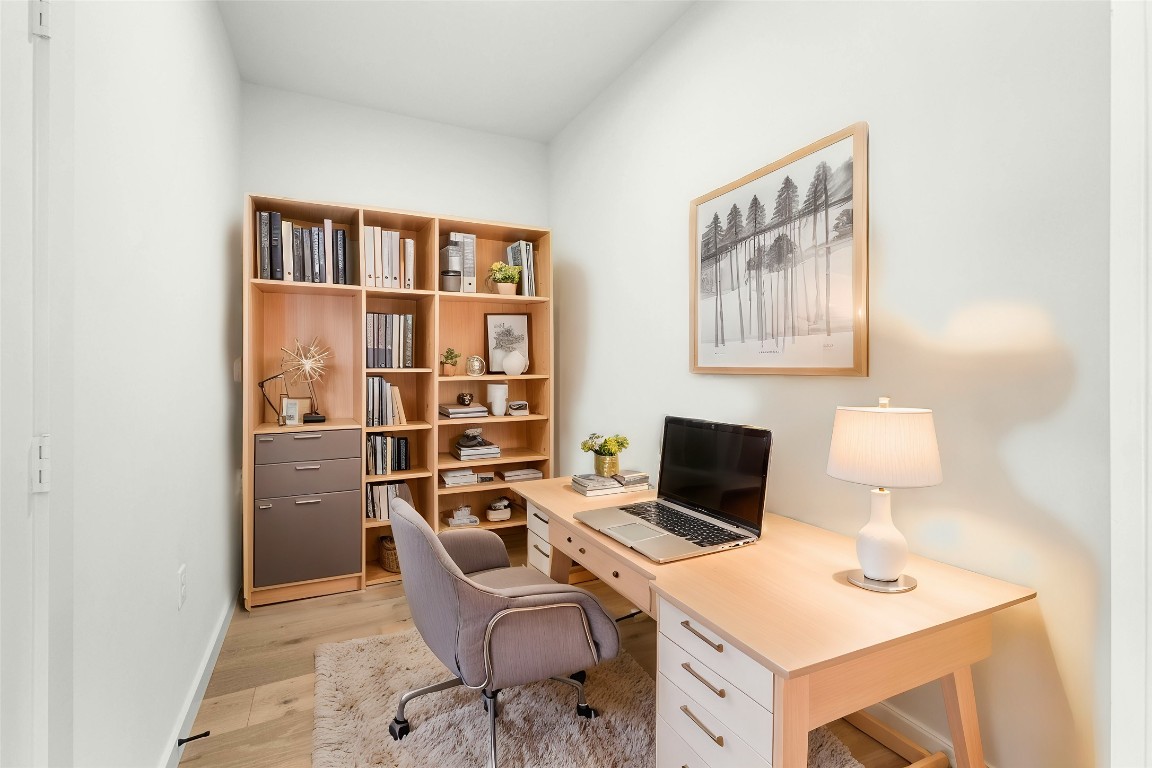 2209 South 1st Street, Unit 226 Austin, TX 78704 - Photo 10 of 27 a view of a workspace with furniture