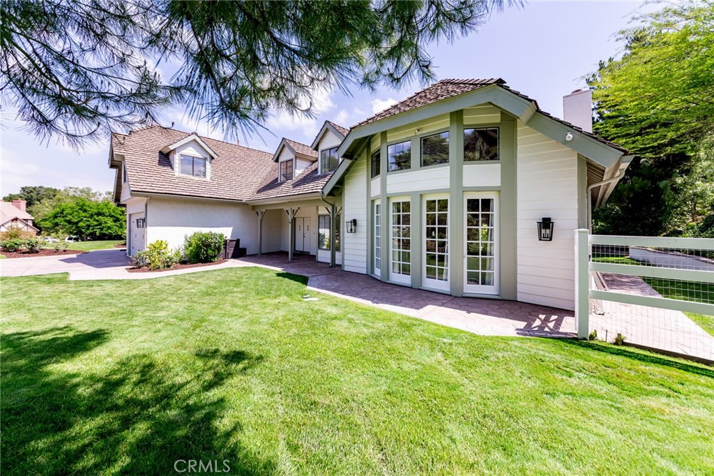 15601 Saddleback Road Canyon Country, CA 91387 - Photo 47 of 55 a front view of a house with a yard