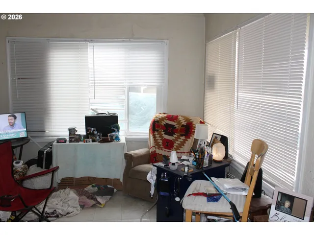 a workspace with furniture and a window