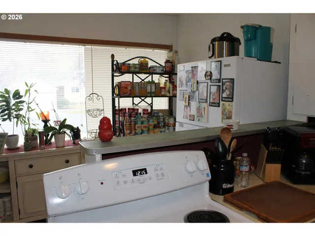 a view of living room with furniture and flat screen tv