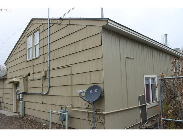 a house view with a outdoor space