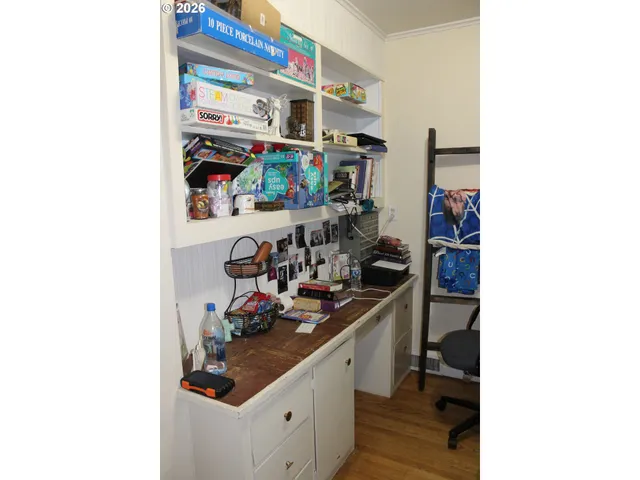 a view of a kitchen with appliances and cabinets