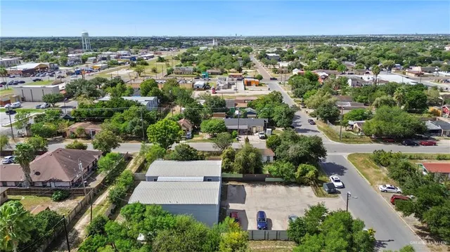 an aerial view of a house with a garden