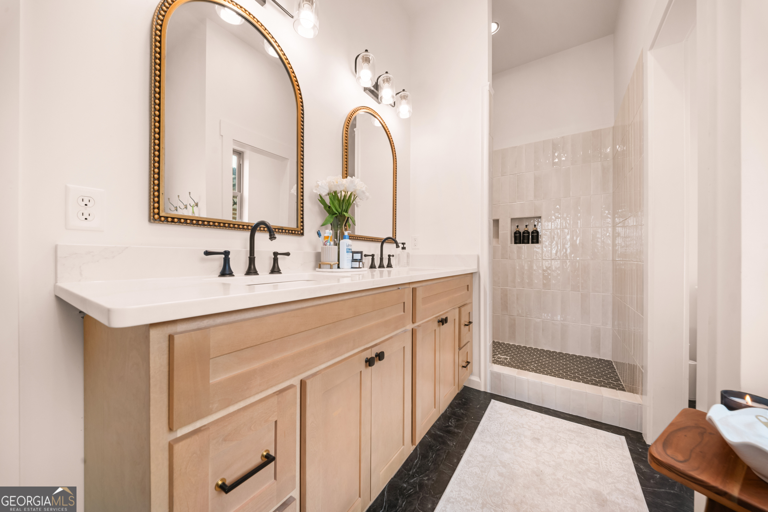 2973 Buttermilk Road Sylvania, GA 30467 - Photo 17 of 48 a spacious bathroom with a double vanity sink and a mirror