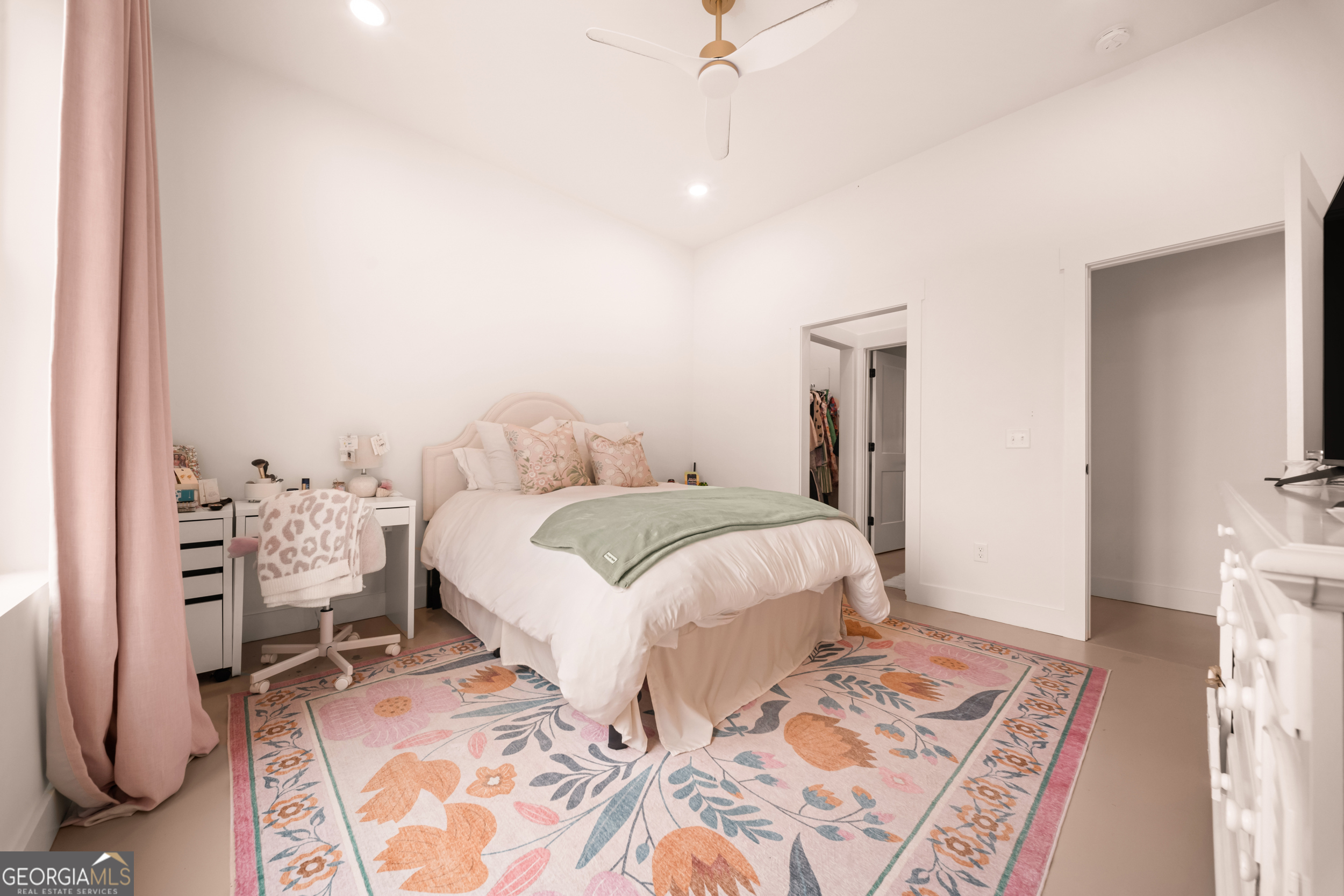 2973 Buttermilk Road Sylvania, GA 30467 - Photo 20 of 48 a bedroom with a bed and a chandelier