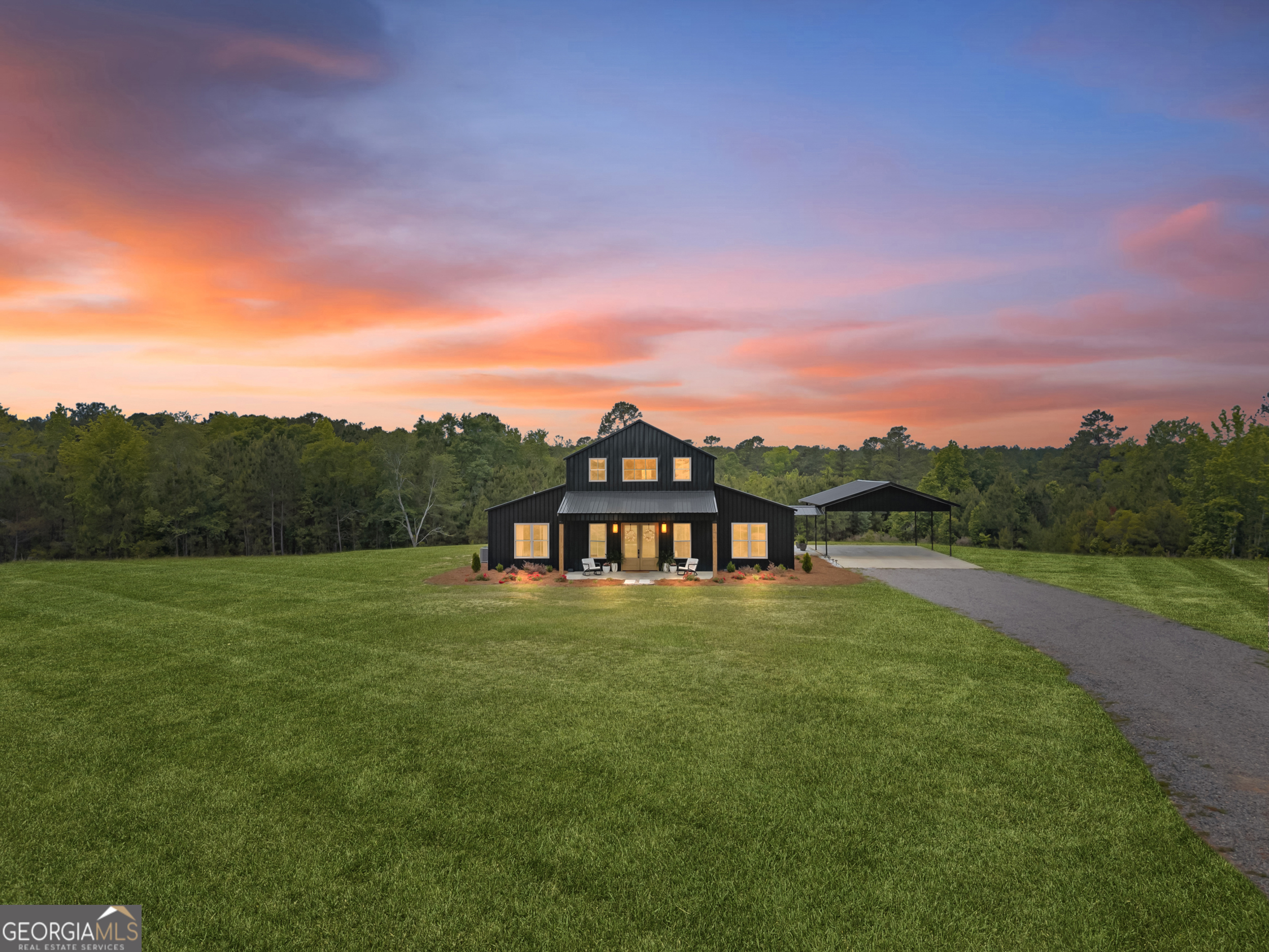 2973 Buttermilk Road Sylvania, GA 30467 - Photo 2 of 48 a view of a city with lush green forest