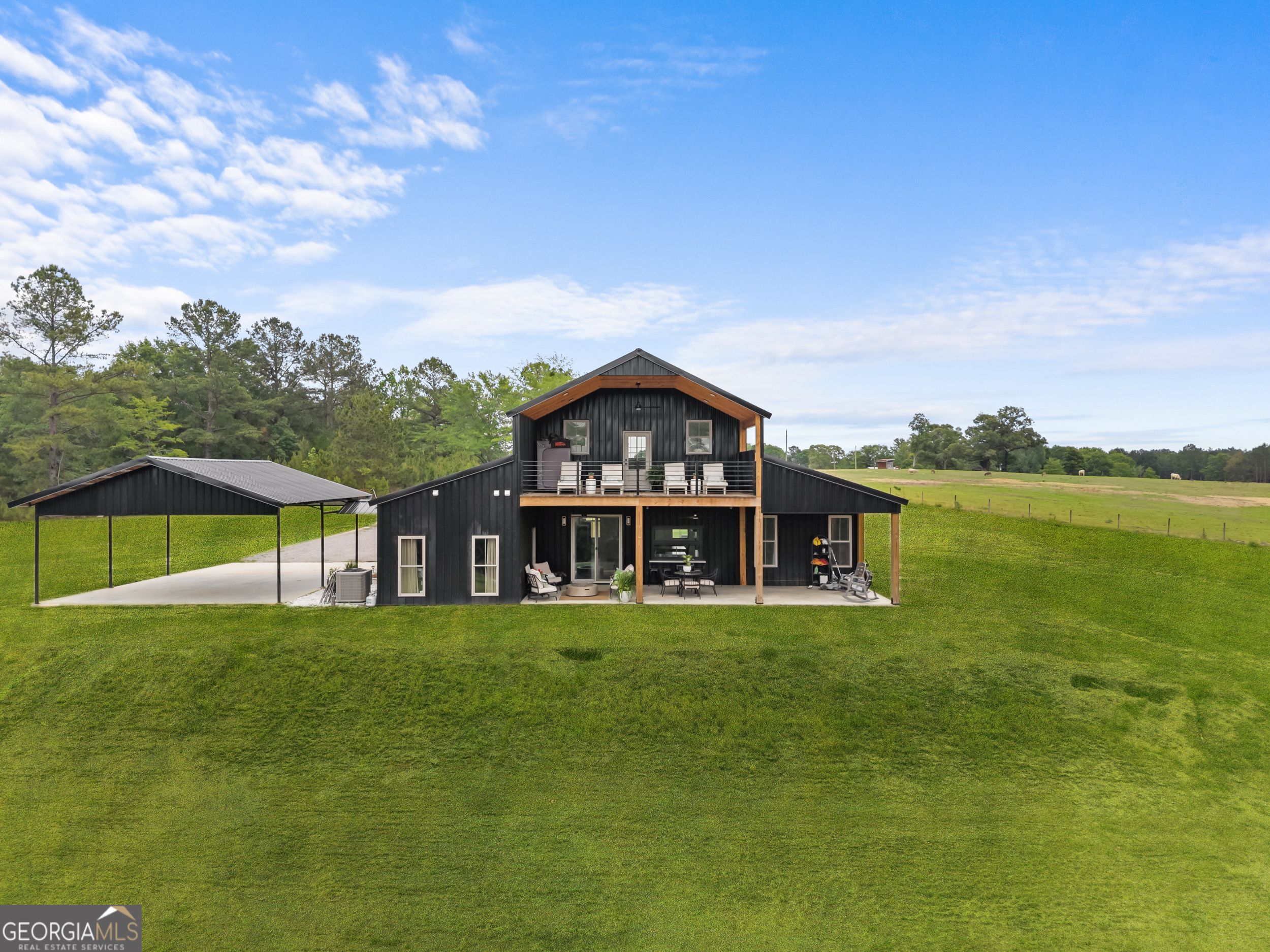 2973 Buttermilk Road Sylvania, GA 30467 - Photo 33 of 48 a view of a house with a garden and lake view