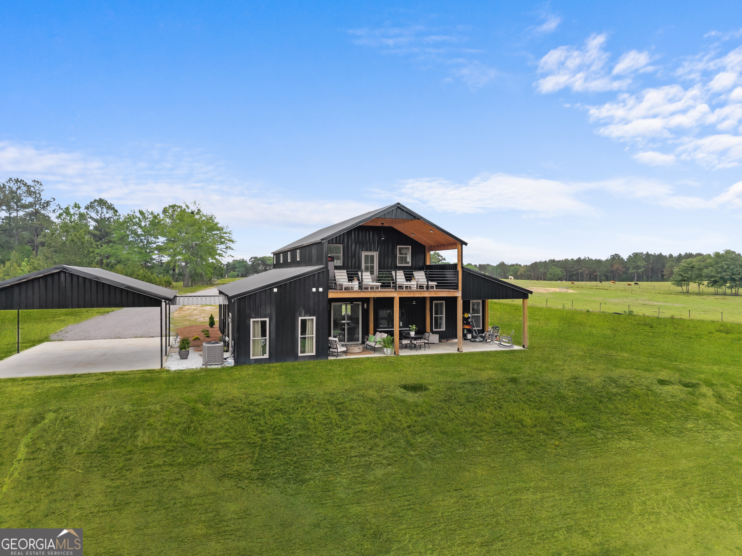 2973 Buttermilk Road Sylvania, GA 30467 - Photo 34 of 48 a front view of a house with garden