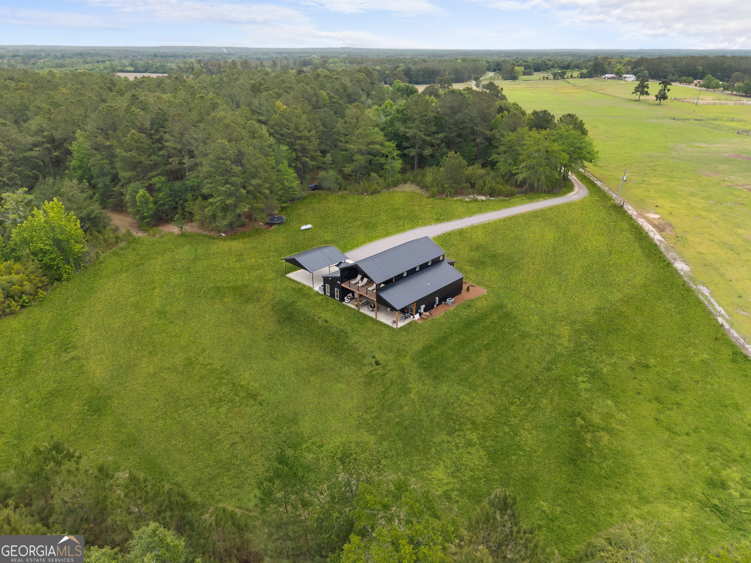2973 Buttermilk Road Sylvania, GA 30467 - Photo 42 of 48 a view of a lake with a mountain