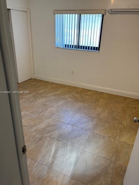 4444 Southwest 67th Avenue, Unit 12 Miami, FL 33155 - Photo 4 of 6 a view of a room with a window