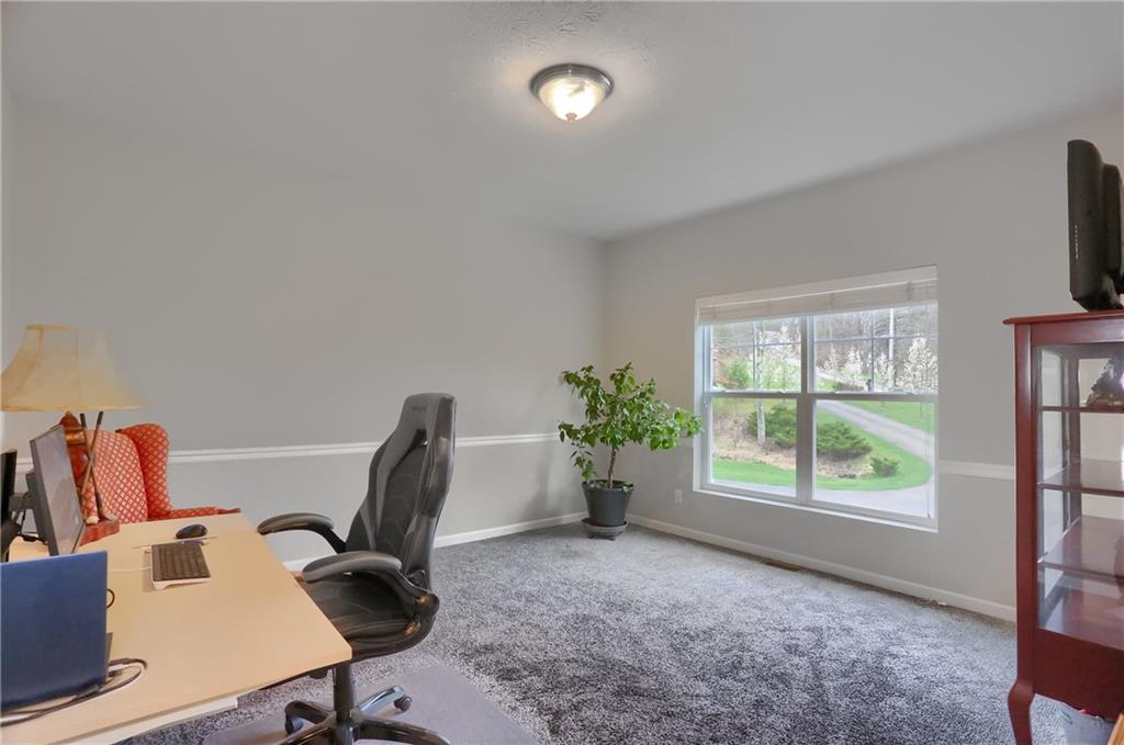 119 Caromar Drive Mars, PA 16046 - Photo 11 of 48 a view of a workspace with furniture and a window