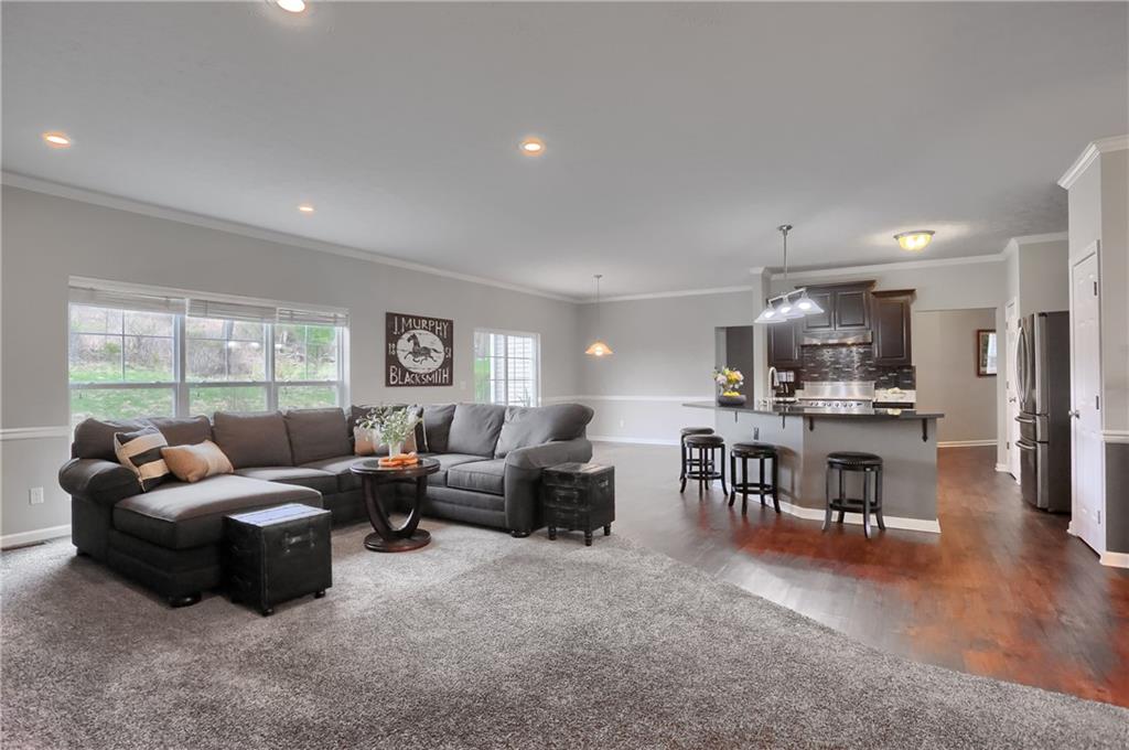 119 Caromar Drive Mars, PA 16046 - Photo 15 of 48 a living room with furniture and a large window