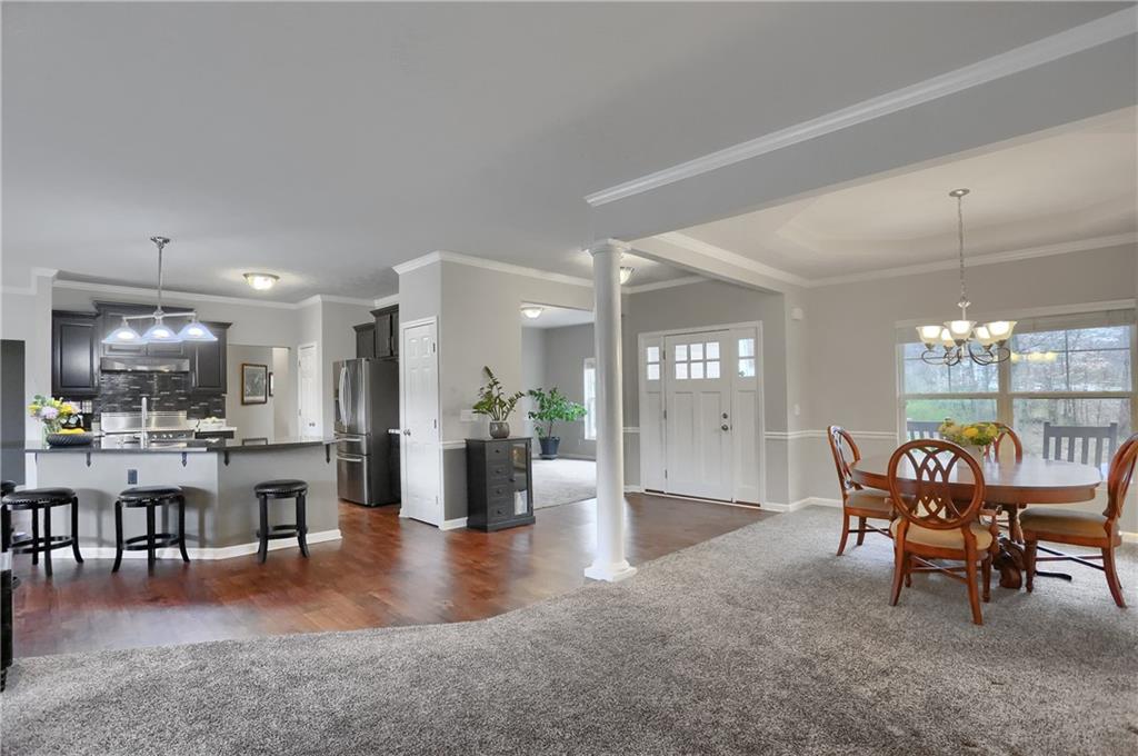119 Caromar Drive Mars, PA 16046 - Photo 16 of 48 a living room with furniture a large window and appliances