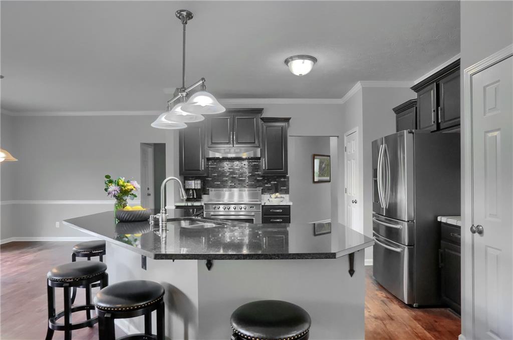 119 Caromar Drive Mars, PA 16046 - Photo 18 of 48 a kitchen with refrigerator and chairs