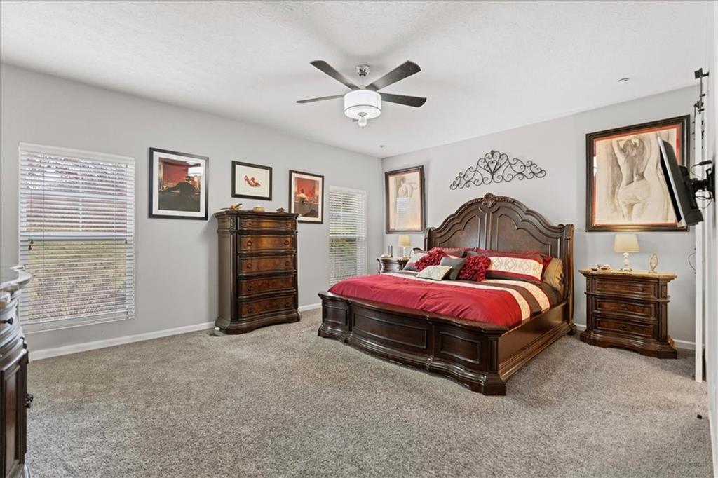 119 Caromar Drive Mars, PA 16046 - Photo 27 of 48 a bedroom with a bed and a chandelier