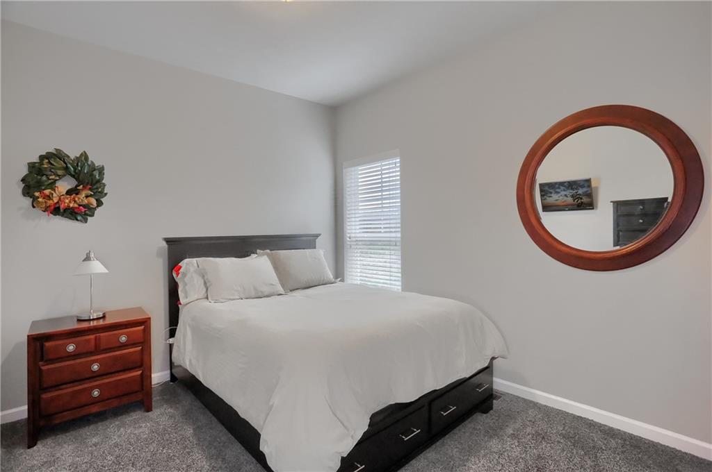 119 Caromar Drive Mars, PA 16046 - Photo 35 of 48 a bedroom with a bed and a lamp on dresser