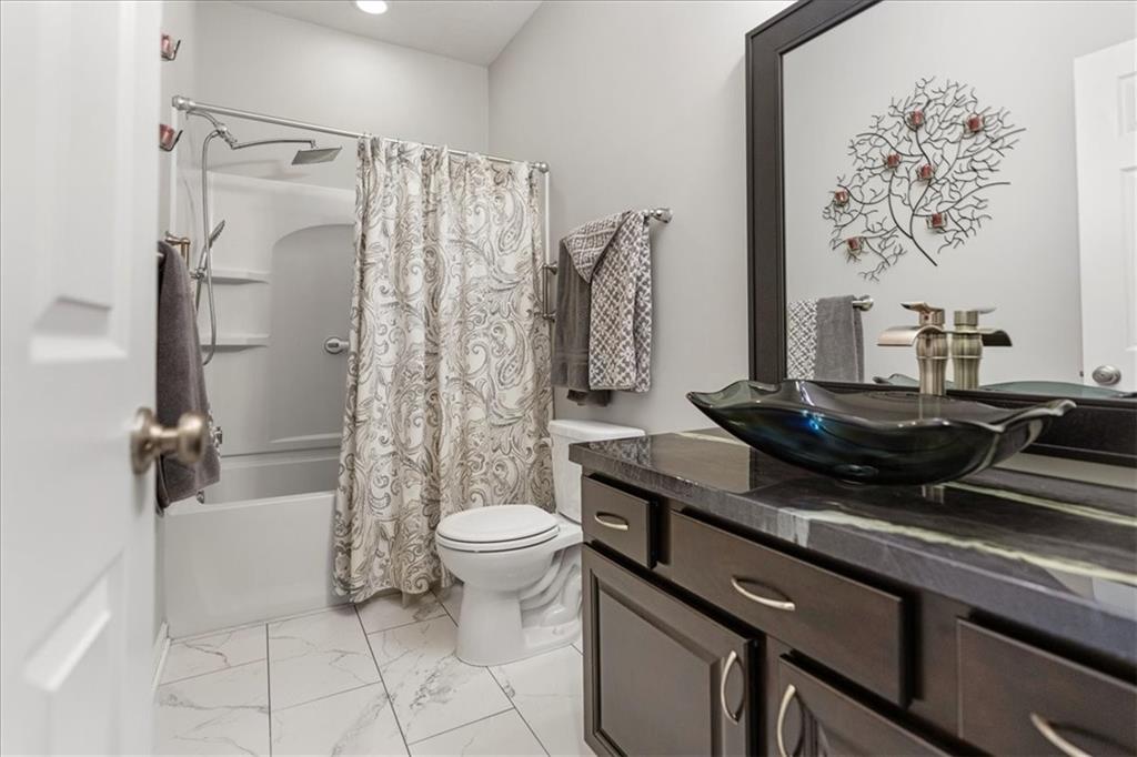 119 Caromar Drive Mars, PA 16046 - Photo 36 of 48 a bathroom with a granite countertop sink toilet and shower
