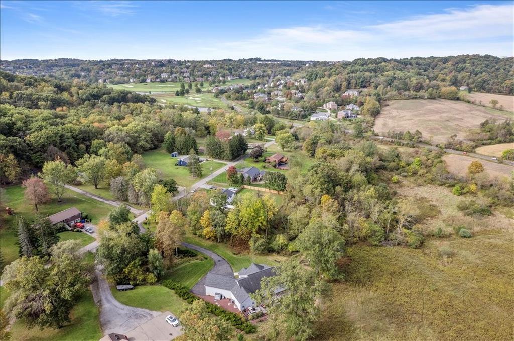 119 Caromar Drive Mars, PA 16046 - Photo 48 of 48 an aerial view of residential houses with outdoor space and trees