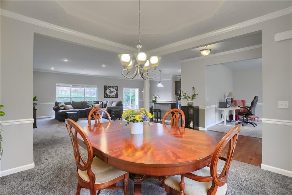 119 Caromar Drive Mars, PA 16046 - Photo 8 of 48 a dining room with furniture and chandelier