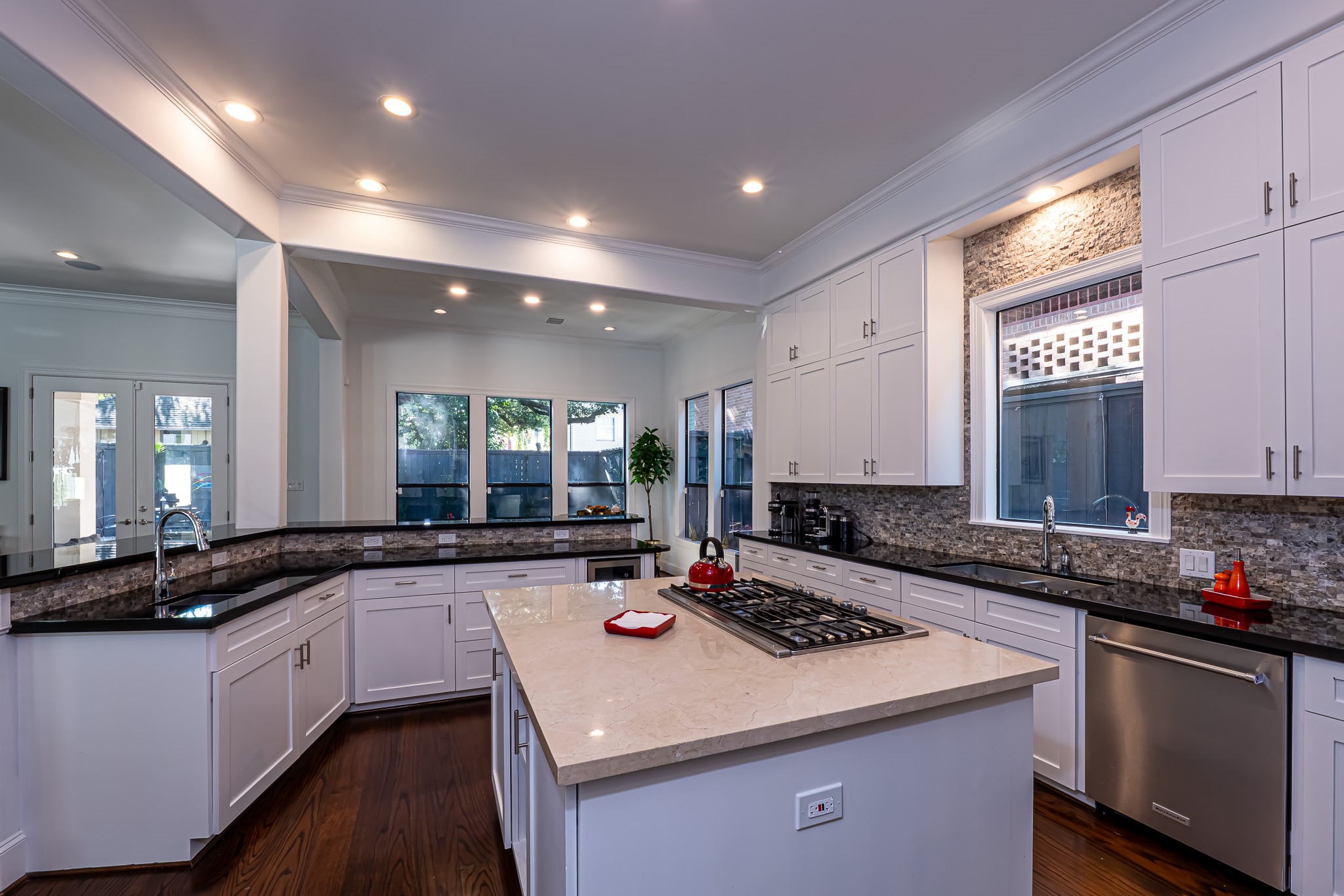 1409 Indiana Street Houston, TX 77006 - Photo 12 of 47 a kitchen with a sink stove and cabinets