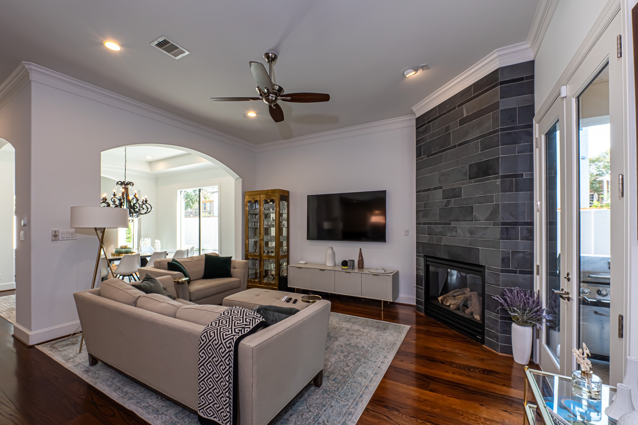 1409 Indiana Street Houston, TX 77006 - Photo 14 of 47 a living room with furniture and a flat screen tv