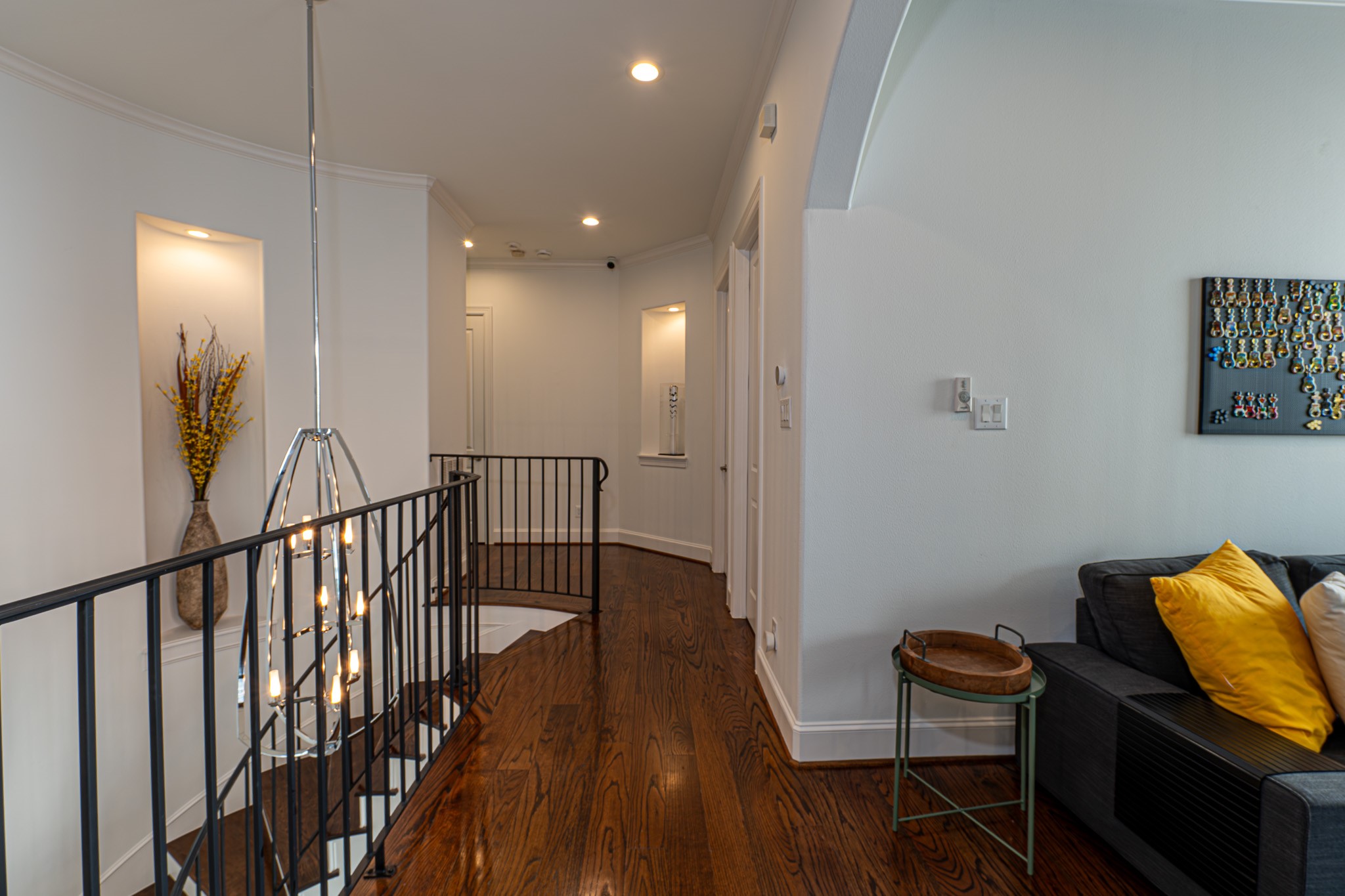 1409 Indiana Street Houston, TX 77006 - Photo 25 of 47 a view of a hallway with wooden floor and furniture