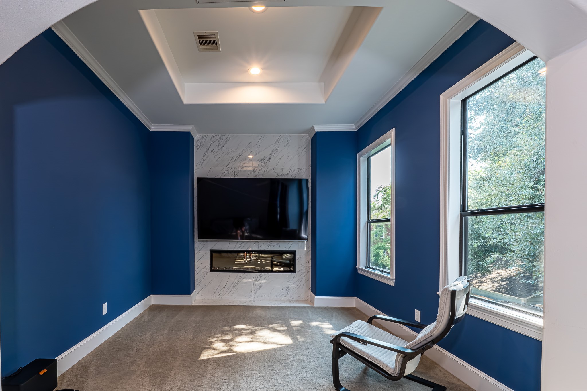 1409 Indiana Street Houston, TX 77006 - Photo 34 of 47 a living room with furniture tv and a window