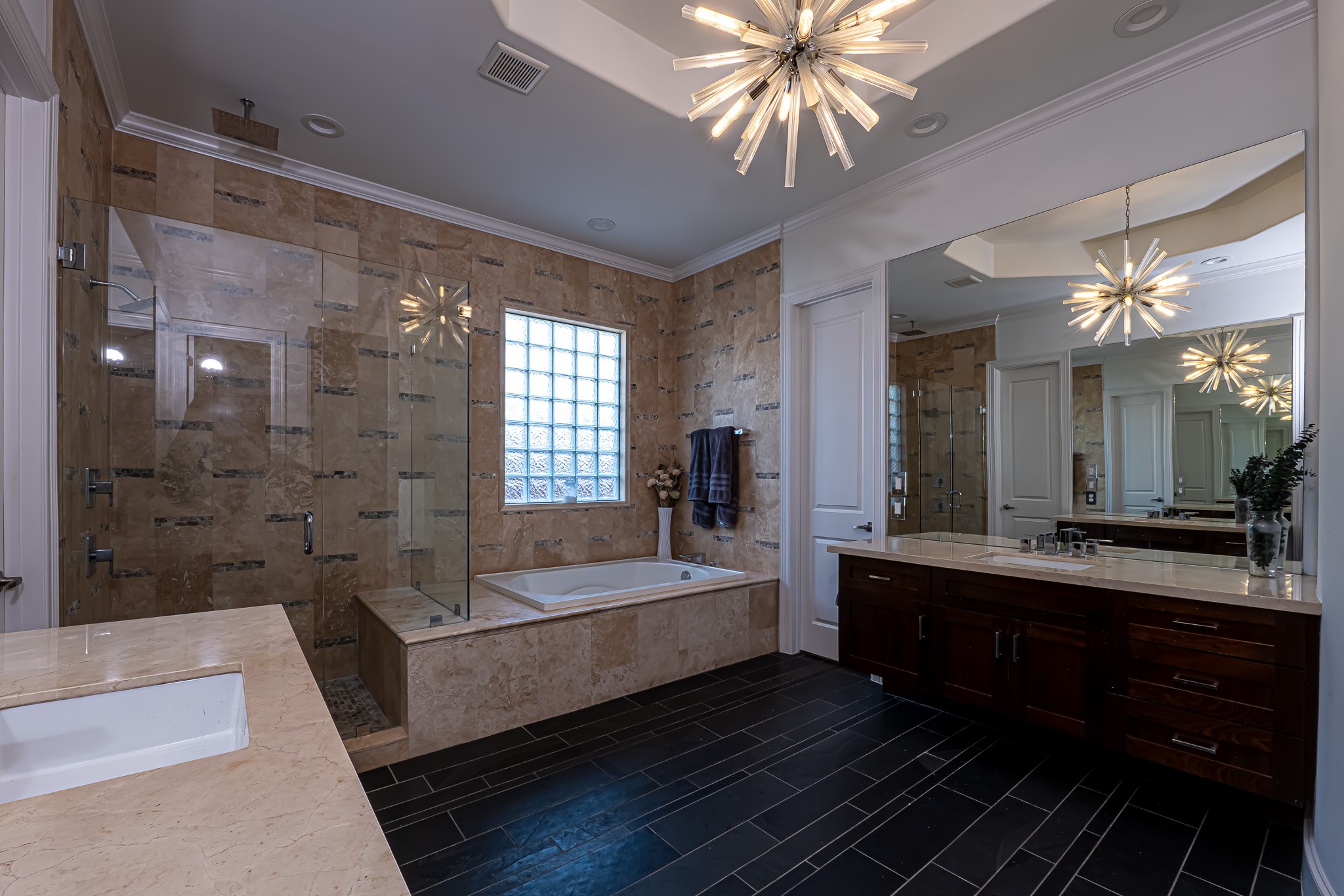 1409 Indiana Street Houston, TX 77006 - Photo 35 of 47 a large spacious bathroom with a tub shower and mirror