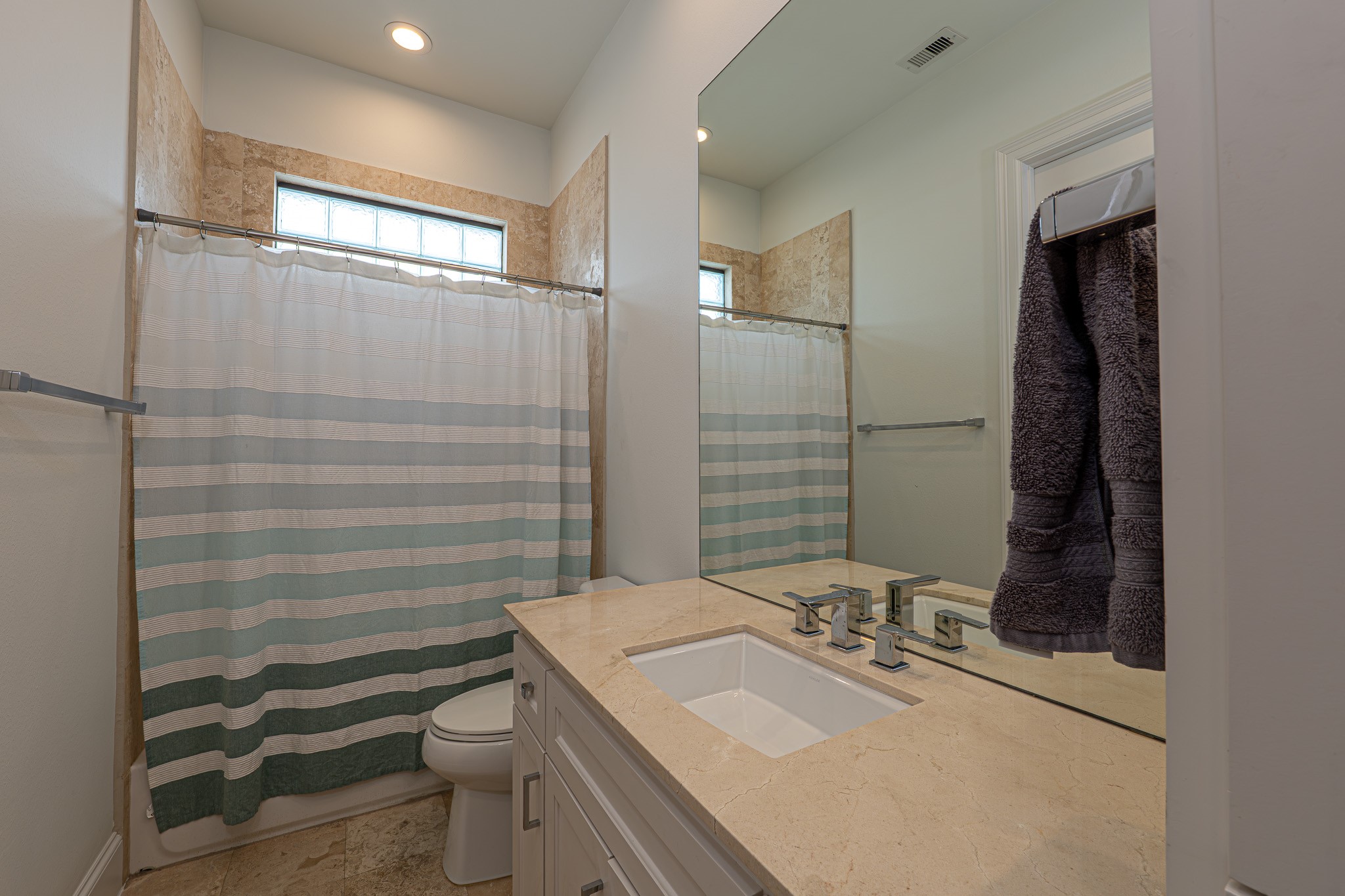 1409 Indiana Street Houston, TX 77006 - Photo 42 of 47 a bathroom with a sink toilet and shower
