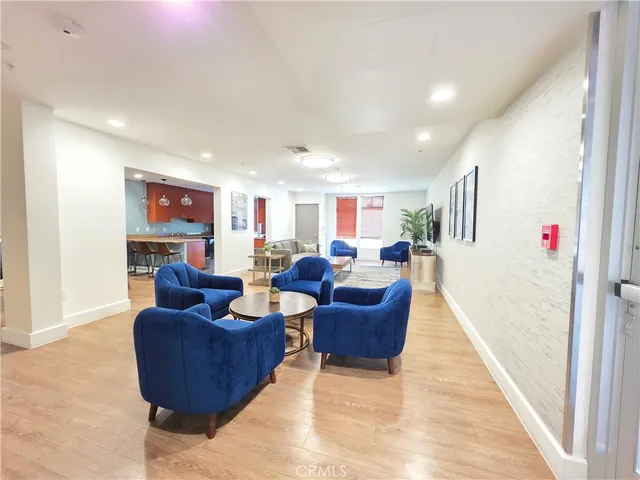 a view of a dining room with furniture and window