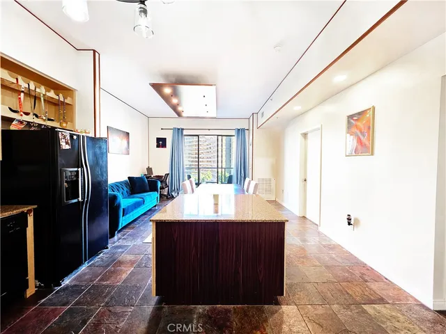 a view of swimming pool with outdoor seating