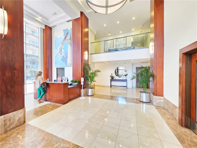 front view of a house with swimming pool and sitting area