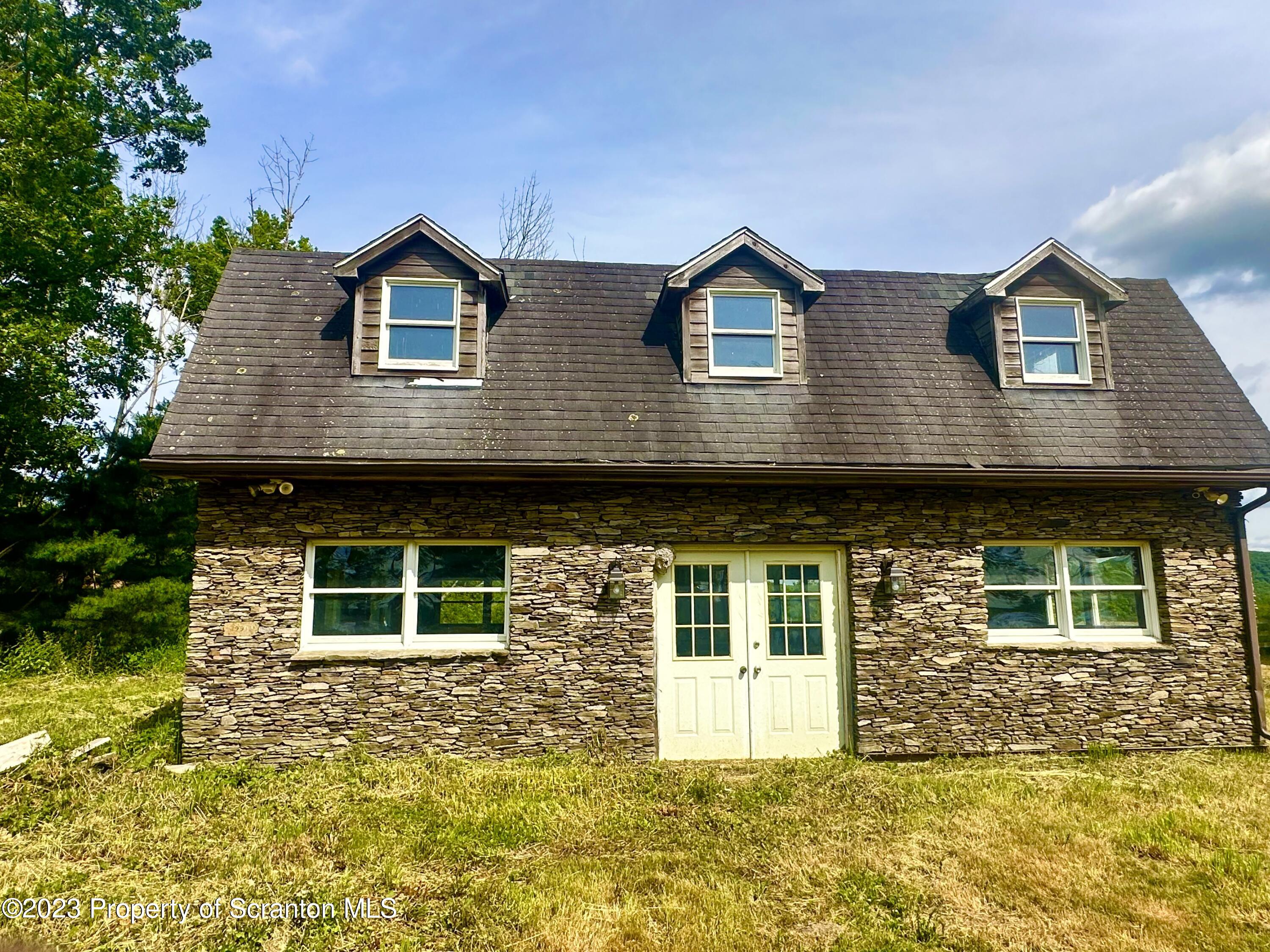 Silver Maple Drive Clarks Summit, PA 18411 - Photo 4 of 8 a front view of a house with a yard