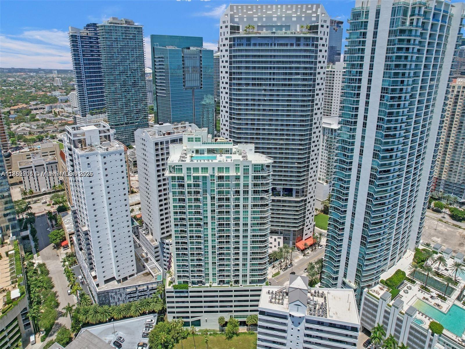 218 Southeast 14th Street, Unit 1407 Miami, FL 33131 - Photo 1 of 7 a view of a city with tall buildings