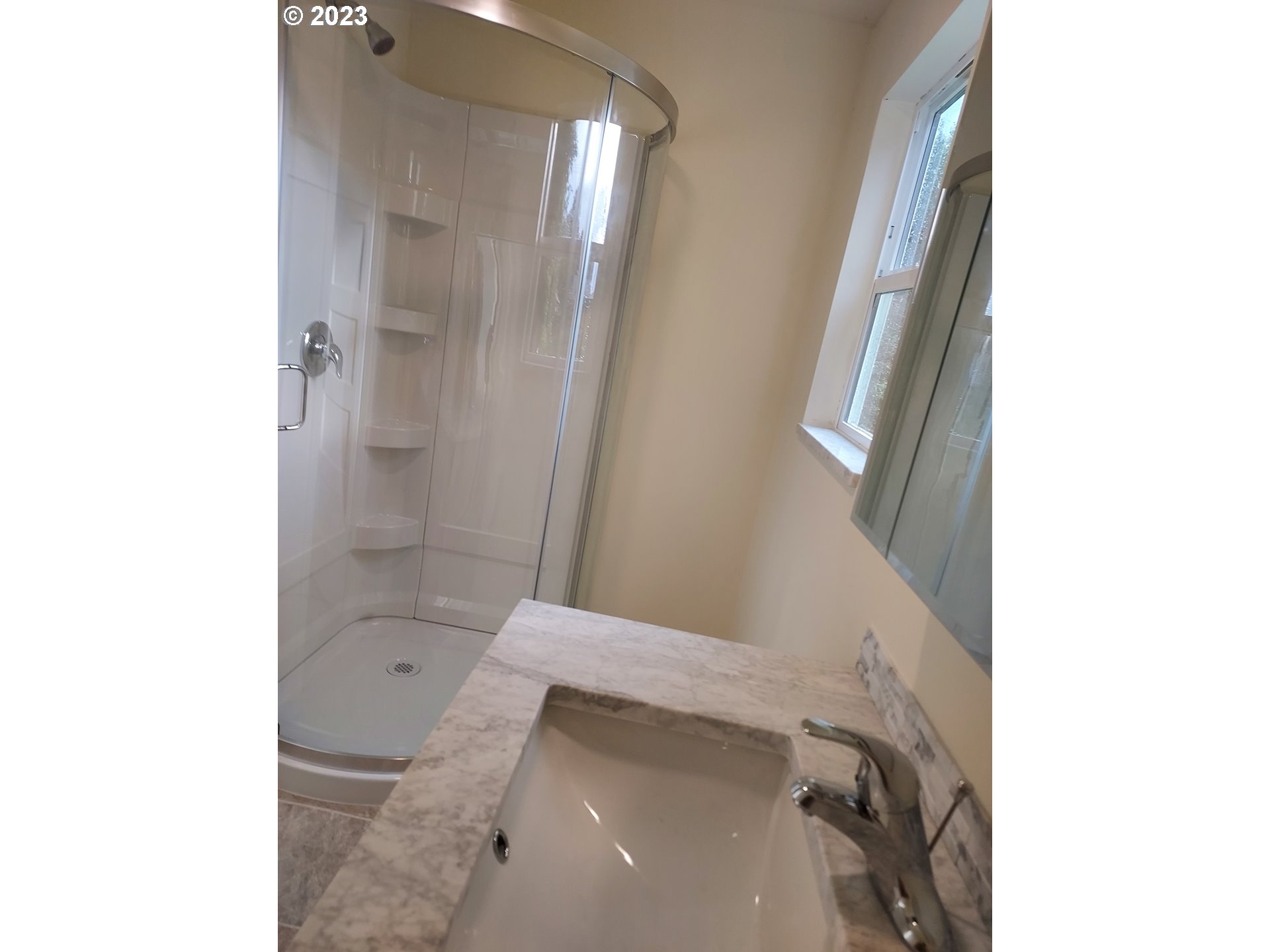 460 37th Street Springfield, OR 97478 - Photo 13 of 21 a bathroom with a bathtub and shower