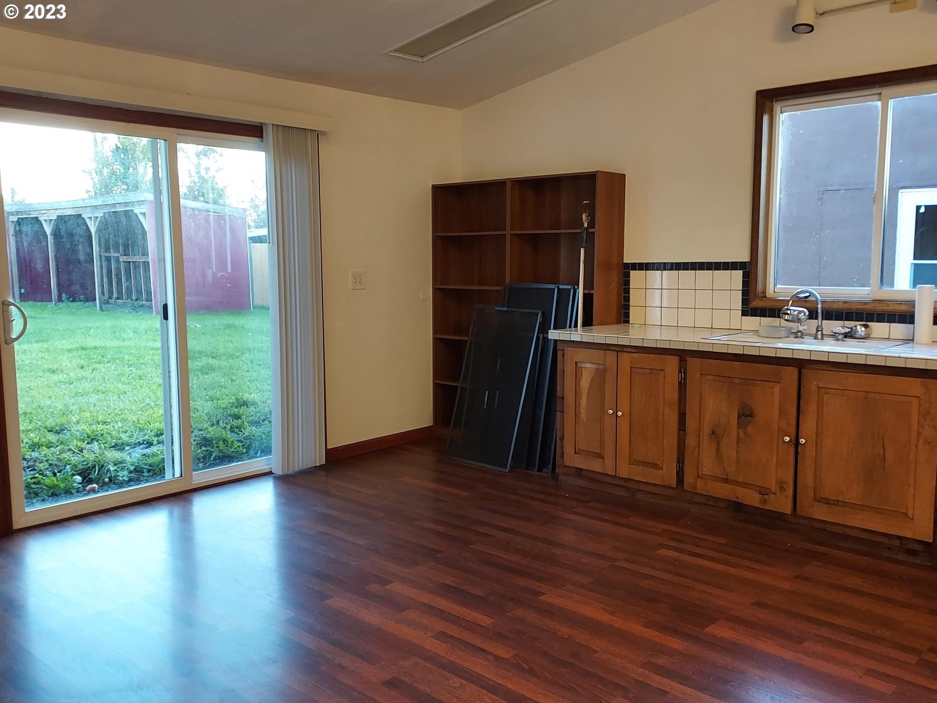 460 37th Street Springfield, OR 97478 - Photo 16 of 21 a view of a kitchen with wooden floor and a window
