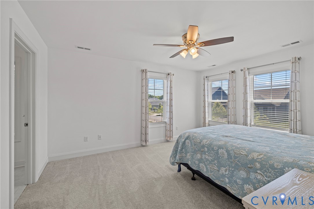 224 Lauradell Road Ashland, VA 23005 - Photo 37 of 74 Bright room featuring light gray carpeting and whi